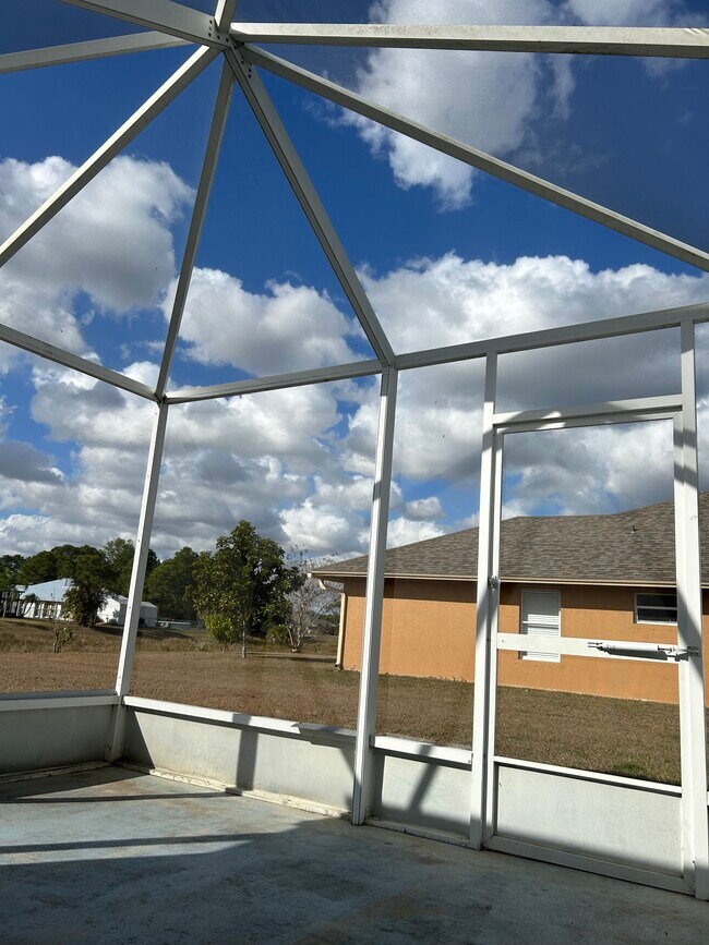 Building Photo - 6480 NW Volucia Dr