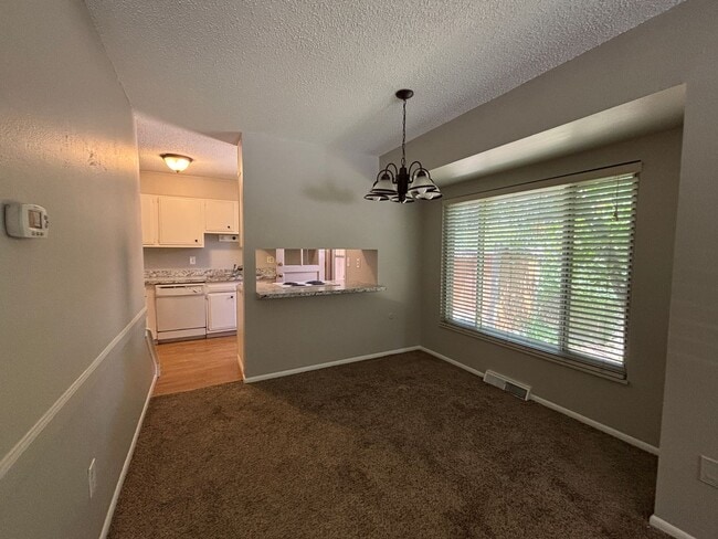 Building Photo - 2-story townhome with 1-car attached garage!