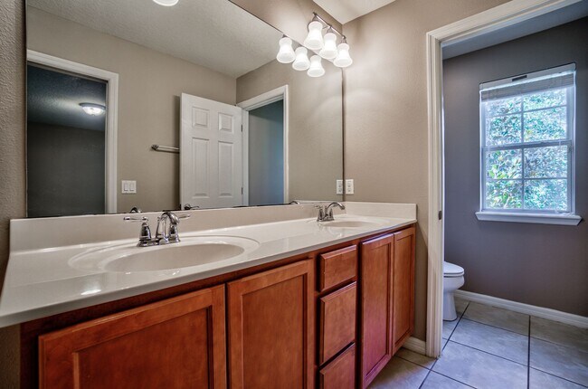 Building Photo - Beautiful 3/3 w/ 2 Car Garage in Gated Vil...
