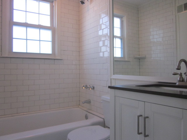 New bath tile, vanity, faucet - 3306 Long Blvd