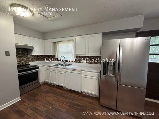 Building Photo - 6576 Ravenwood Ave NW