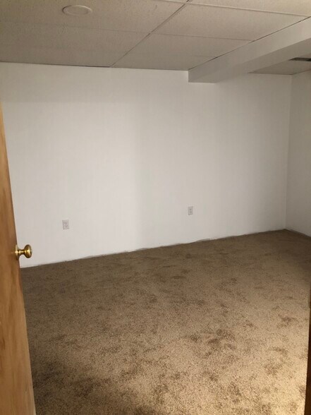 Lower level bedroom/office has closet - 2650 Tamlynn Ct