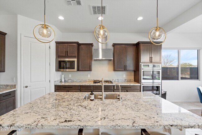 Building Photo - 10812 E Tesla Ave