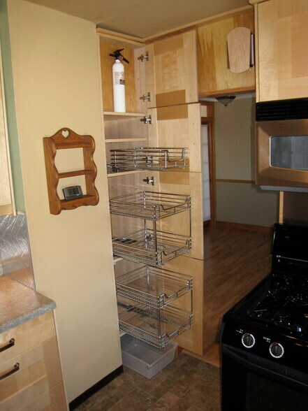 Kitchen with Gas Range and Microwave - 314 3rd Ave SE