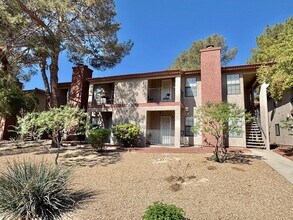 Building Photo - COMFORTABLE 2 BEDROOM, 2 BATHROOM FIRST-FL...