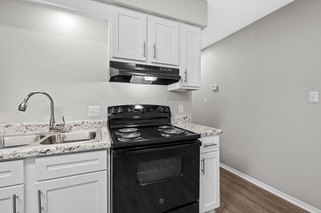 Building Photo - Cozy 2 Bedroom Duplex with Fireplace & Spacious Backyard!