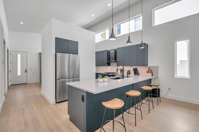 Building Photo - Luxury Living in Grand Central District: Exquisite Furnished Home with Pool