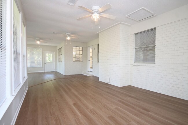 Building Photo - Fully Renovated 3BR/2BA Molino Home on a Spacious Lot Featuring Multiple Living Areas, Sunroom & ...