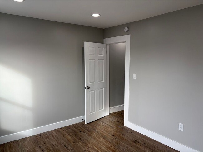 Building Photo - Newly Renovated 2- Story Townhome with Front Porch and Back Yard