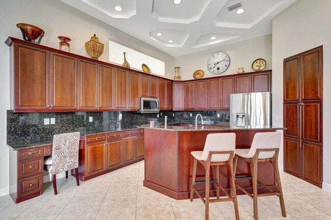 Building Photo - 9315 Via Classico W