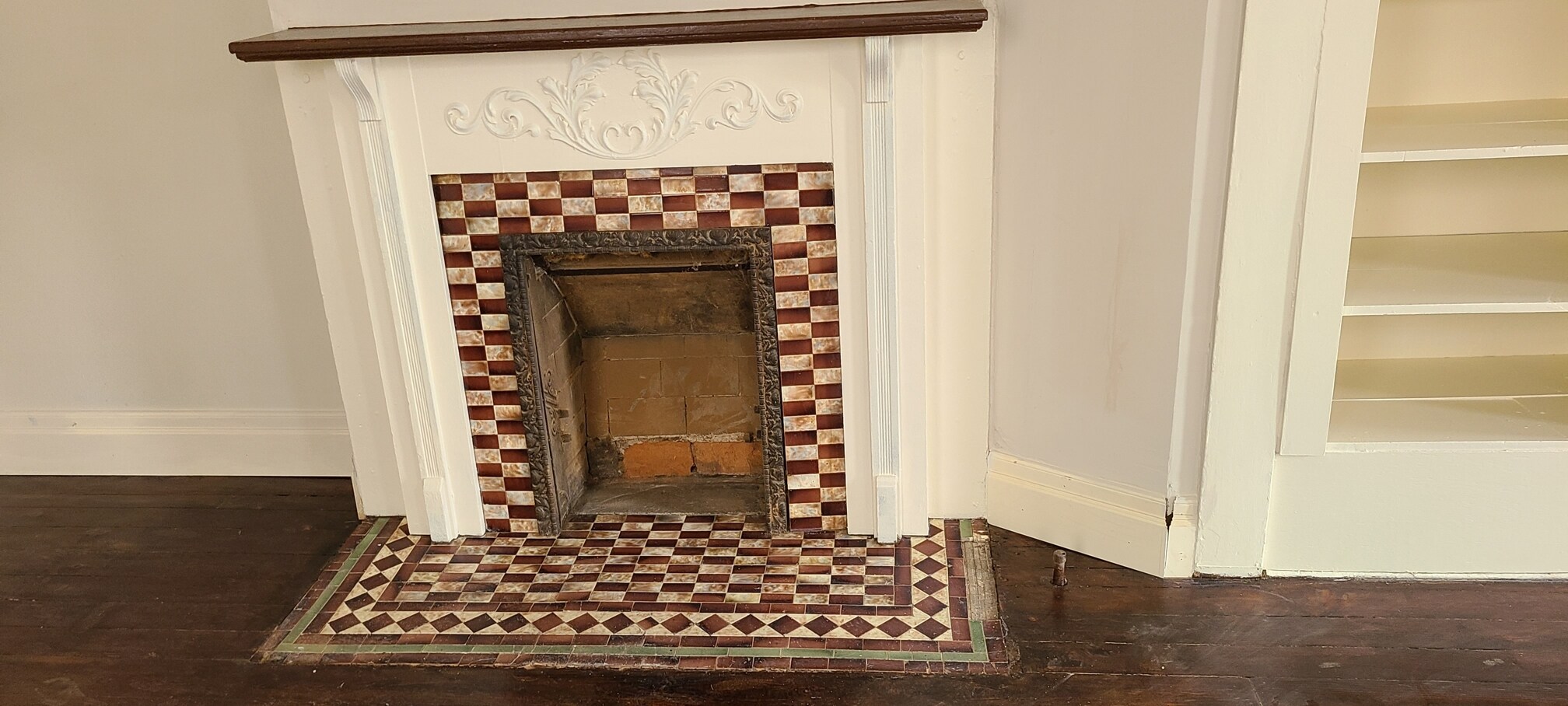 Rookwood Fireplace - 208 E 9th St