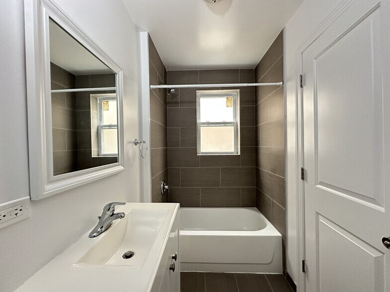 Building Photo - 1640 W Pratt Blvd