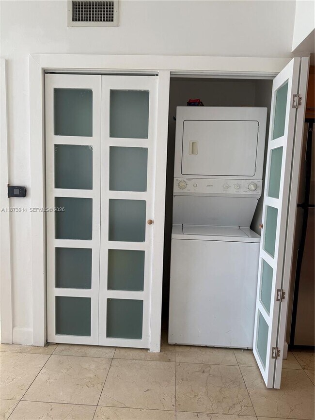 Building Photo - 6365 Collins Ave