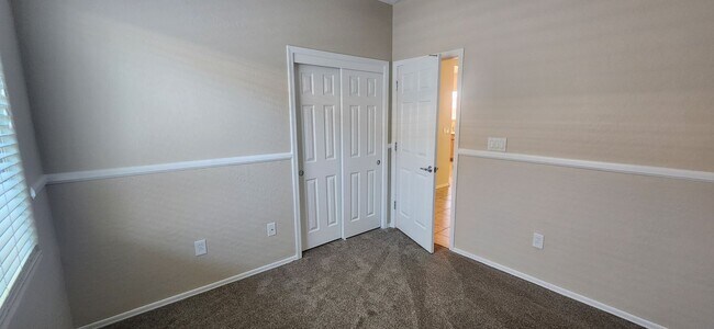 Building Photo - Freshly painted & all new carpeting - 3BR ...