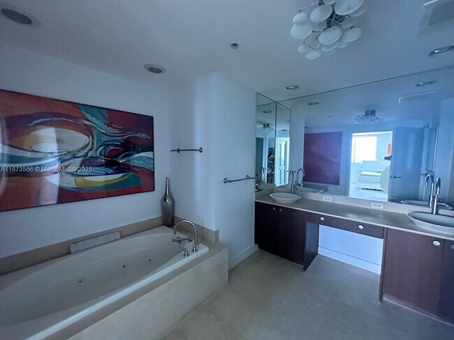 Building Photo - 3801 Collins Ave