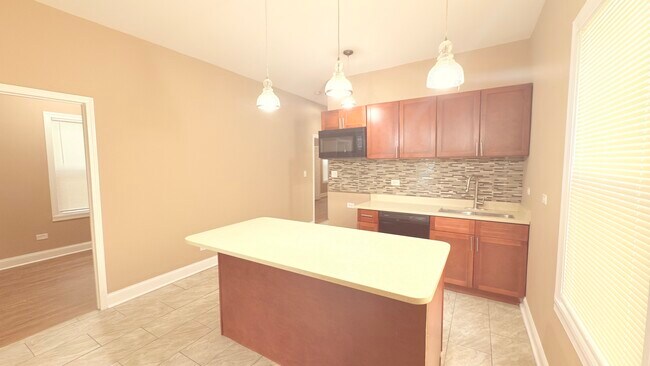 Building Photo - 9738 S Ave L