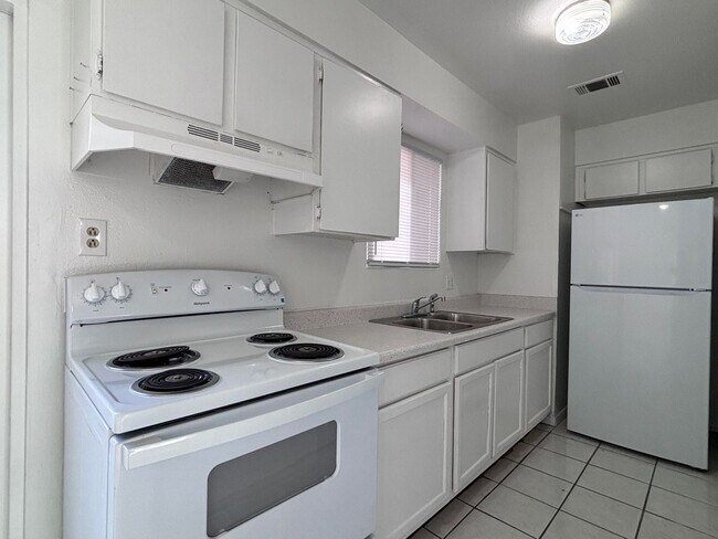 Building Photo - Charming Two-Story Townhouse with Fresh Updates & Prime Location