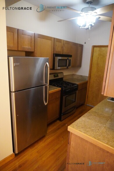 Building Photo - 6357 N Lakewood Ave