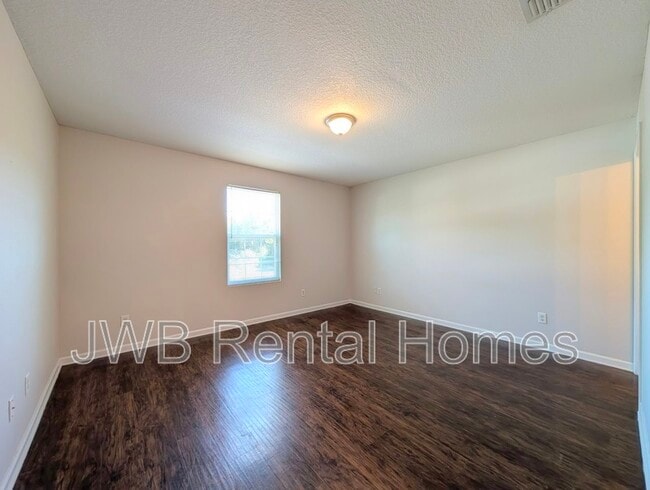 Building Photo - 8401 McGirts Village Ln