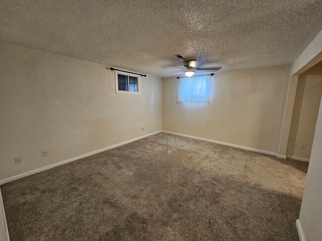 Building Photo - 4-Bedroom Home with In-Ground Pool, Solar ...