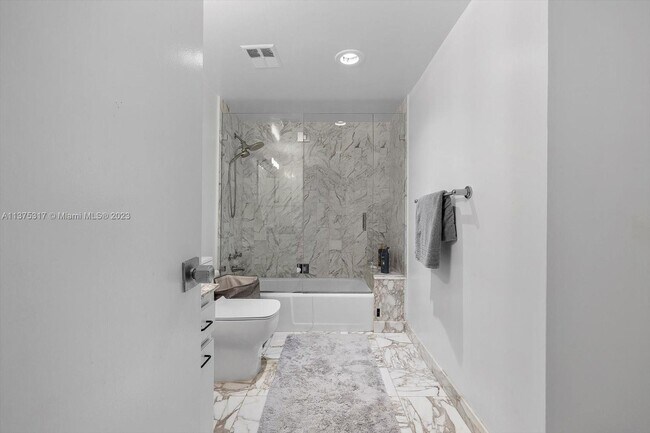 Building Photo - 10155 Collins Ave
