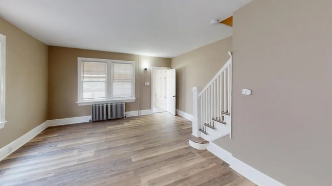 Building Photo - Renovated Twin Home Now Available for Immediate Move In