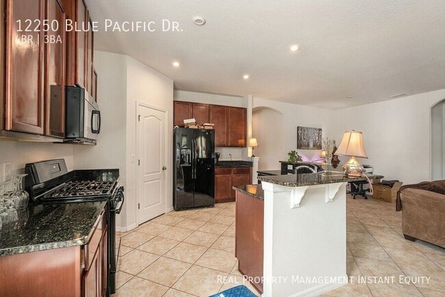 Building Photo - 12250 Blue Pacific Dr