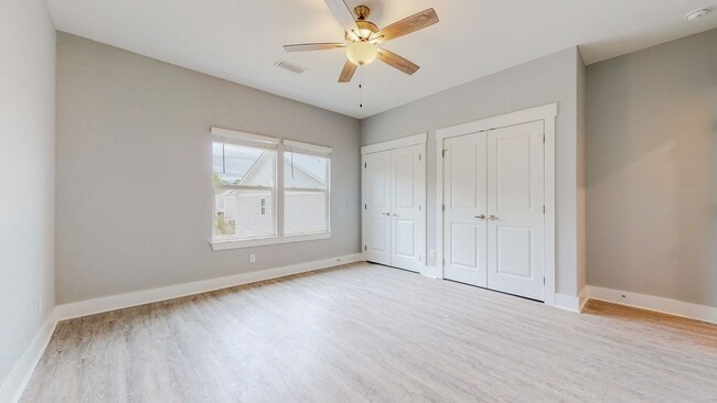 Building Photo - End unit!  Washer/Dryer Included! Beautiful 3 Bedroom Townhome (larger floorpan) with Screened-In...