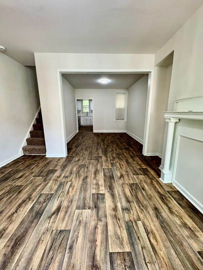 Primary Photo - Spacious 3-Bedroom Home with Modern Amenit...