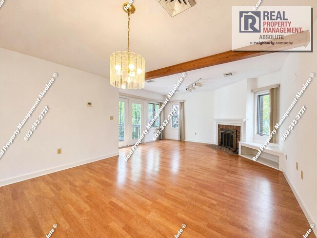 Building Photo - Spacious 2BR/2BA Condo with Garage, Balcony, Pool & Mine Falls Access
