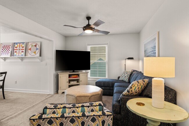 Building Photo - Furnished Pet-Friendly 30-Day Extended Stay Riverfront Condo