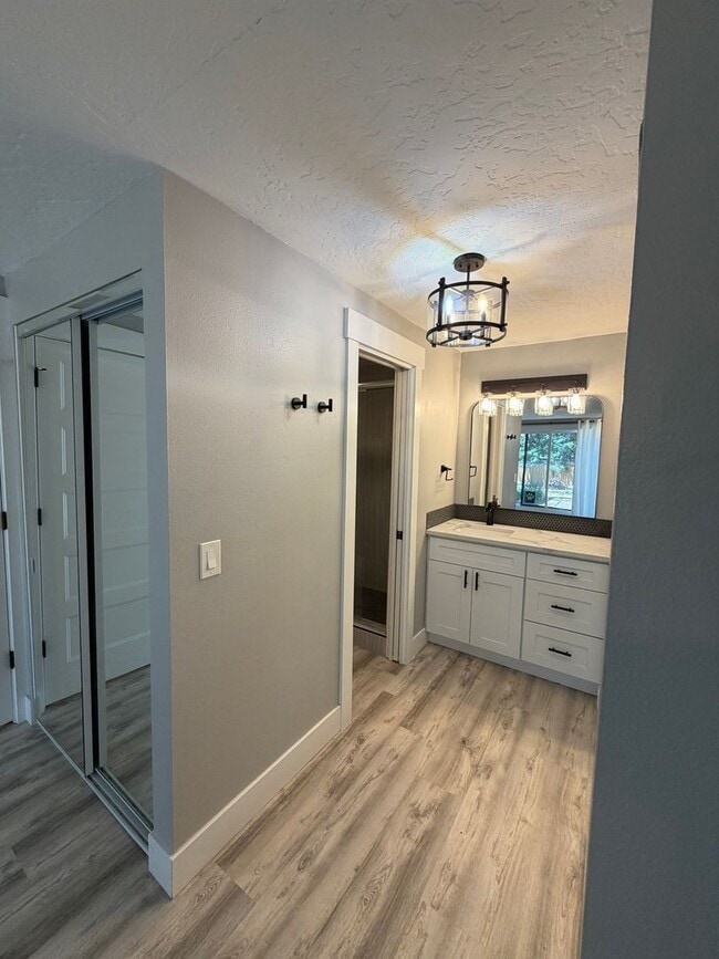 Building Photo - Spacious 4BR/3BA Home with Deck, Fenced Yard & Garage
