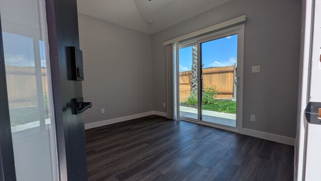 Building Photo - Fenced Private Yard in Newer Build Studio ...