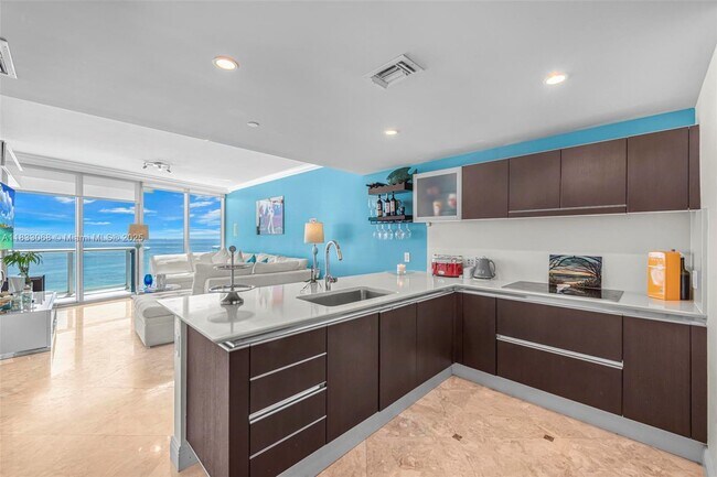 Building Photo - 17001 Collins Ave