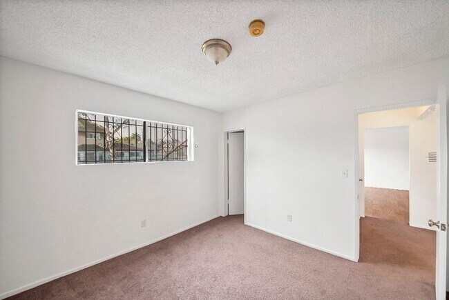 Building Photo - 2458 Normandie Ave