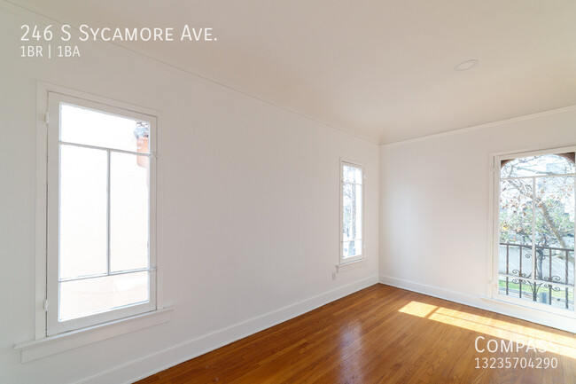 Building Photo - A Grand, Light-Filled 1-Bedroom with Bonus...