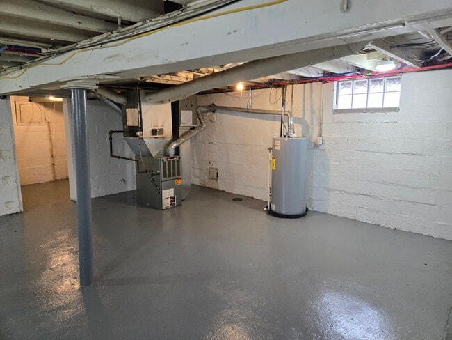 Building Photo - 1343 E. Broadway. House with basement and ...