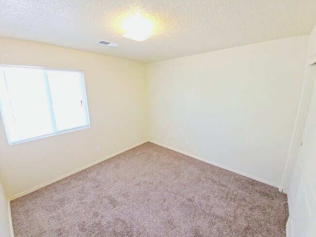 Building Photo - Gorgeous 4-bedroom, 2-bath home featuring two spacious living areas