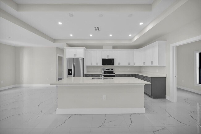 Building Photo - Brand-New Home in Lehigh Acres – Move-In Ready! FL 33974. Qualify for a deposit-free option and s...