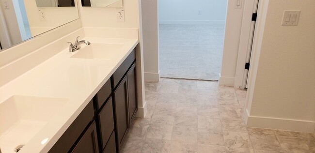Building Photo - The 2 YEARS NEW 4 bedroom + 3 car garage r...