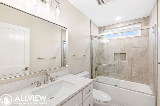 Building Photo - Welcome to this stunning 5-bedroom, 4-bath...