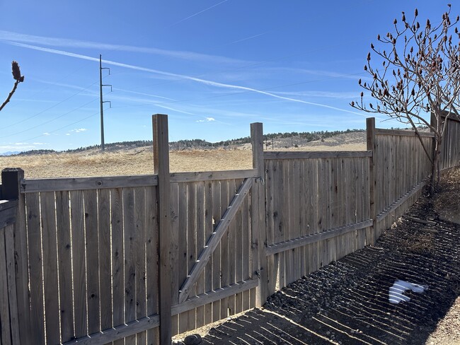 Backyard gate to trail - 4005 Cotopaxi Dr