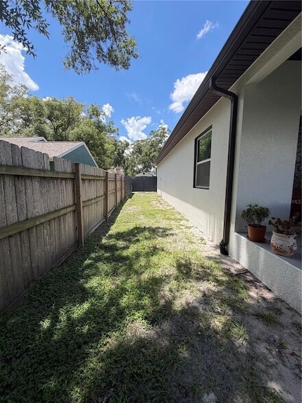 Building Photo - 4411 N Tampania Ave