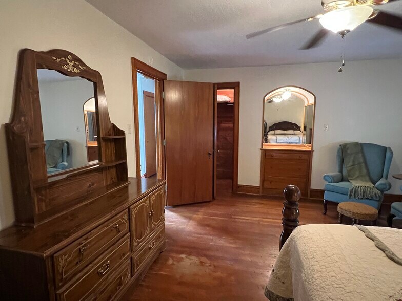 Bedroom One. Queen bed. 1 person. - 209 Main St