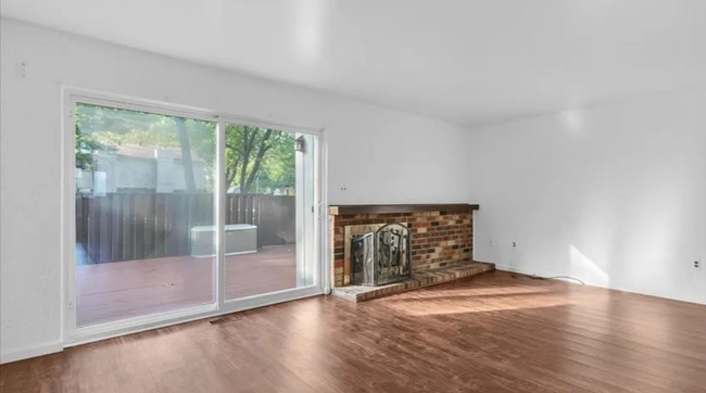 Beautiful hall with a fireplace and attached outdoor patio. - 2134 Wickham St