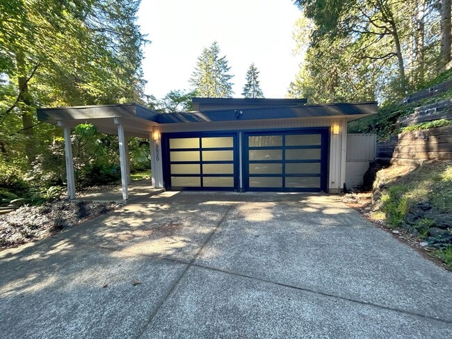 Building Photo - Gorgeous mid century modern home featuring...