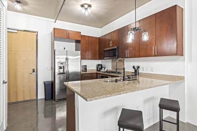 Building Photo - Furnished Juhl Condo w/ Balcony & City Views