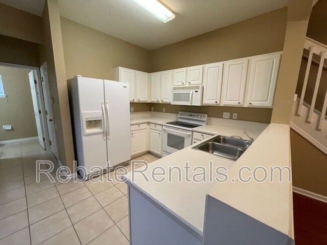 Building Photo - 7478 Scarlet Ibis Ln