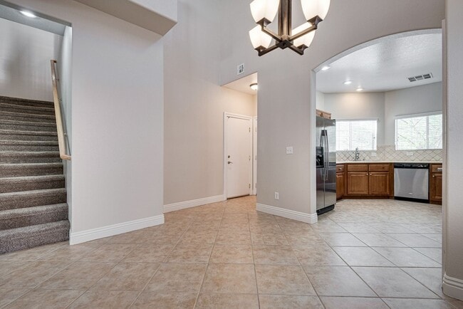 Building Photo - Spacious 3-Bedroom Home Featuring Downstai...