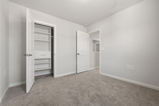 Building Photo - Move-In Ready 4BR Home | Deck, Patio & Open Concept Living